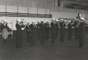 Concert, Bob is the trumpet player on the far left